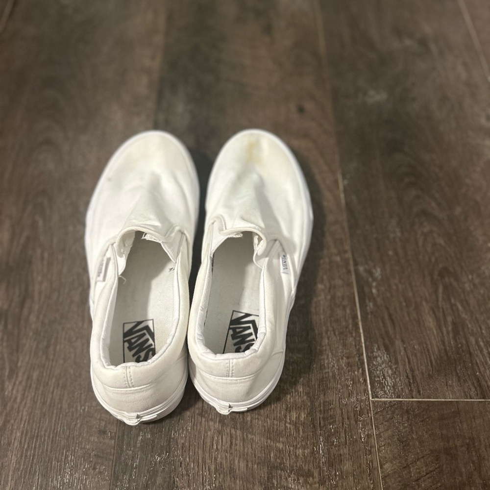 White slip on Vans